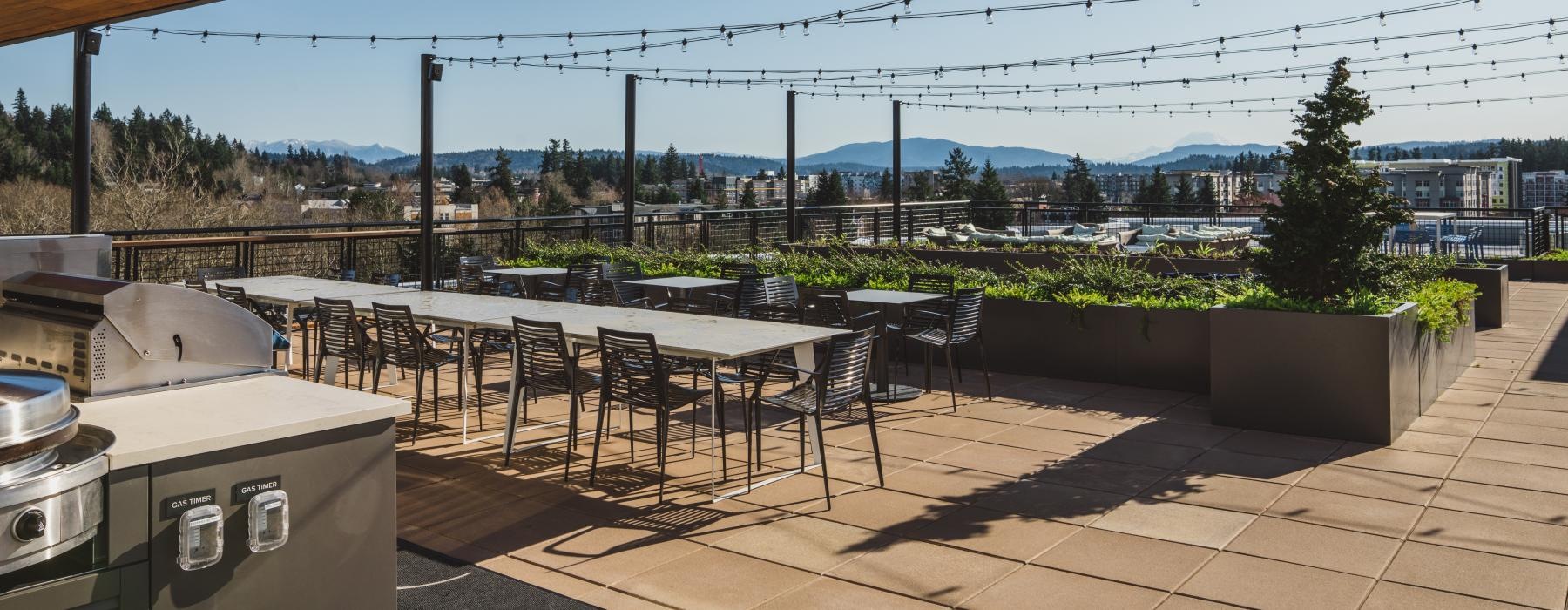 a patio with tables and chairs